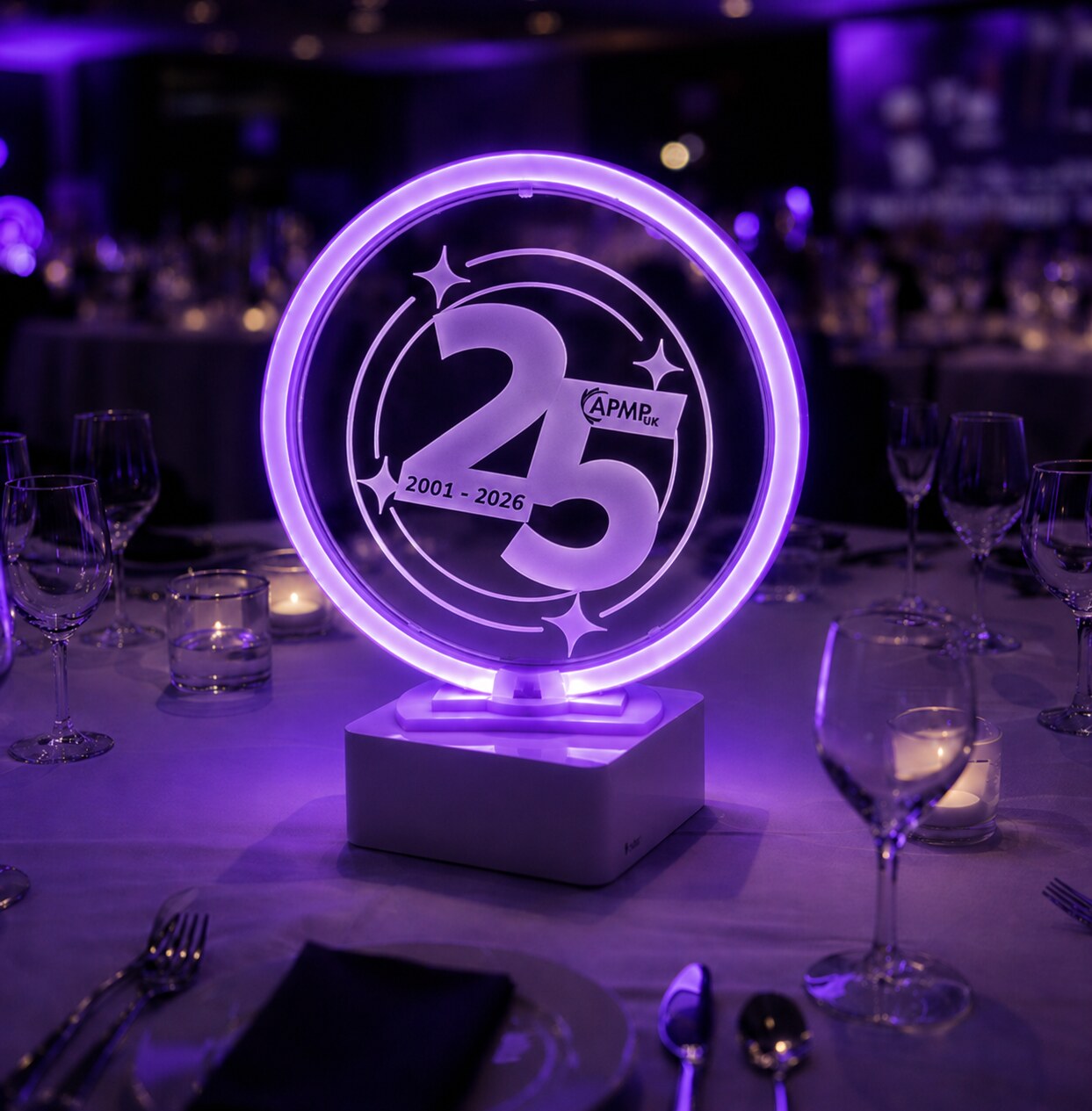 APM UK 25th anniversary illuminated circular table centrepiece