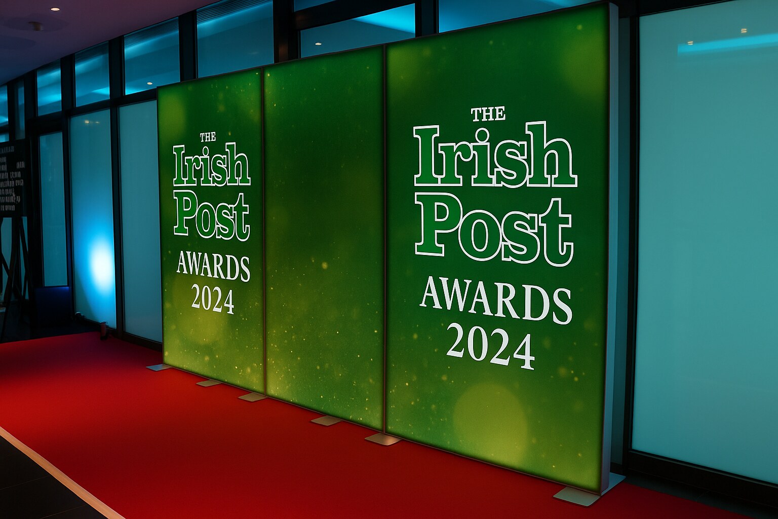 Green Irish Post Awards 2024 step-and-repeat backdrop with red carpet